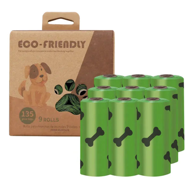 Green rolls of dog waste bags with a brown packaging box labeled 'Eco-Friendly' on a white background.