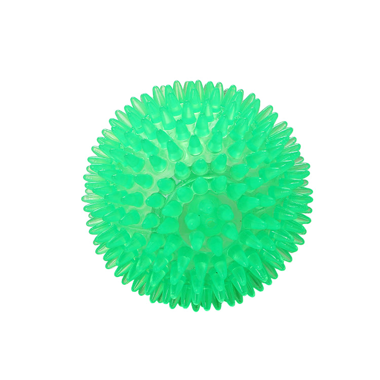 Green spiky ball on a white background