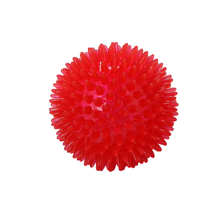 Red textured spiky ball on a white background